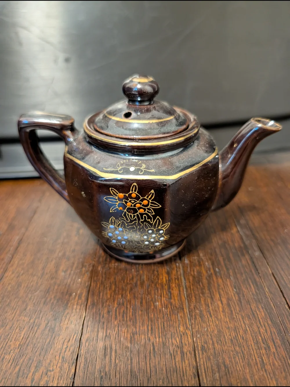 Brown Ceramic Teapot with Hand-Painted Floral Detail